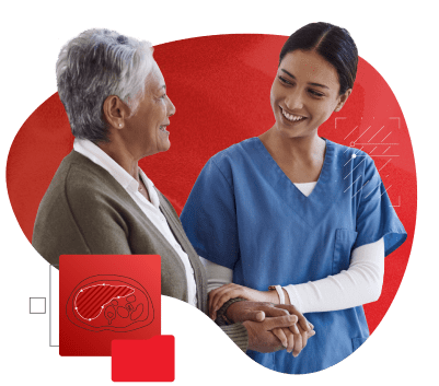 An older woman holding hands with a female nurse